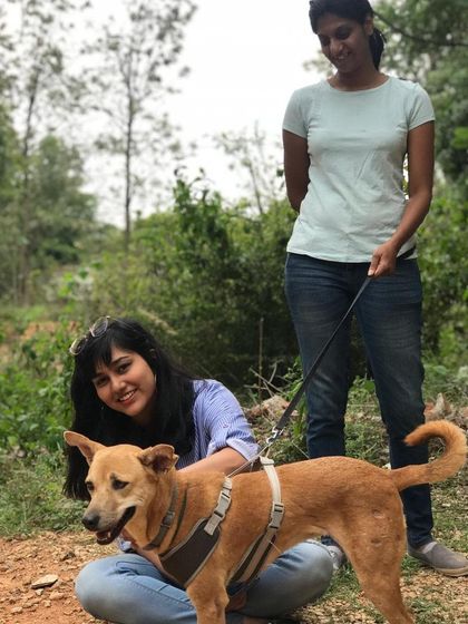 A photo of me with an Indie dog during a workshop. I make sure to give every dog individual attention.