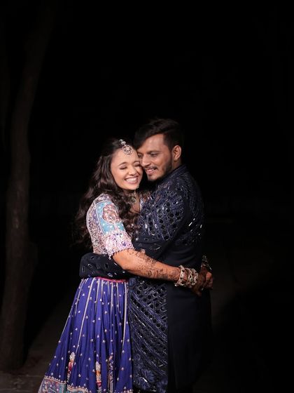 Capturing the pure happiness between a couple on their Dandiya night. Her makeup is kept fresh and luminous, designed to be long-lasting and picture-perfect throughout the entire event.
