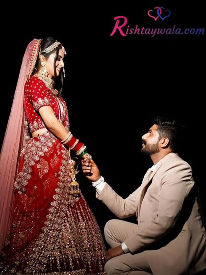 A groom proposes to his bride, a romantic gesture that marks the beginning of their forever. Find your romantic partner with us.
