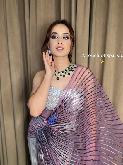 A touch of sparkle. This look is all about confidence, with a dramatic eye and glowing skin.