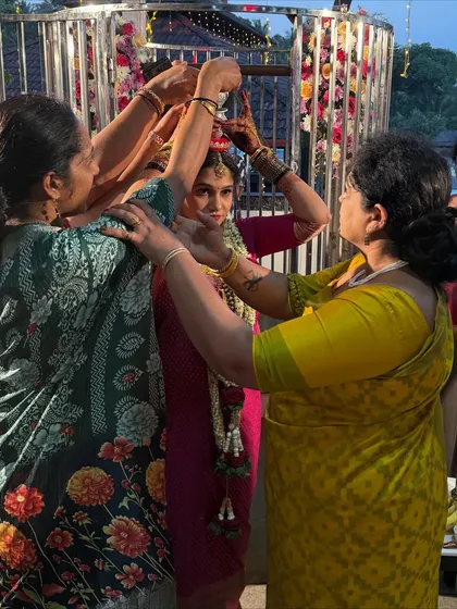 Helping with the bride's preparations. The community and family bonds in our culture are incredibly strong and supportive.