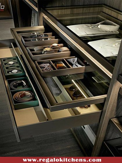 An illuminated multi-level drawer system. The glass-bottomed trays allow light to filter through, making it easy to find what you're looking for in every layer.