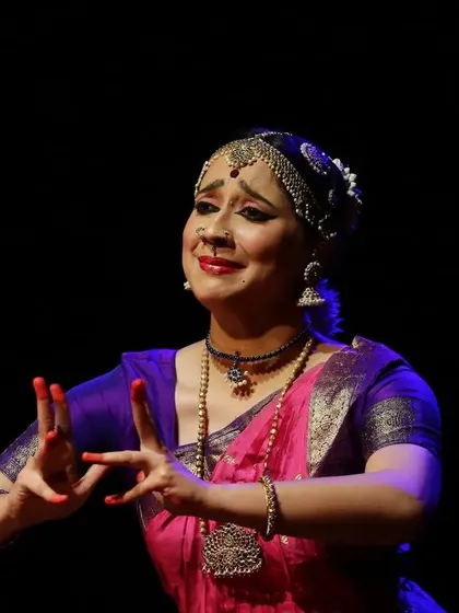 Sunidhi Gurudutt, a moment of serene expression during her performance.