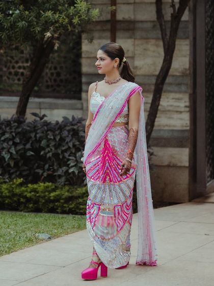 A full-length shot of the bride, showing off her unique and stylish carnival outfit.