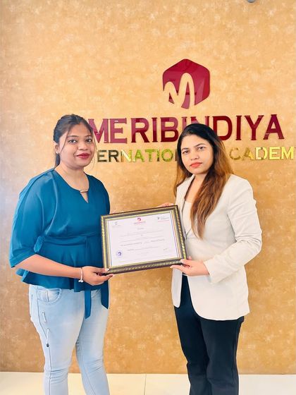 The joy of accomplishment is clear on her face. We are so proud of our graduates and their achievements.