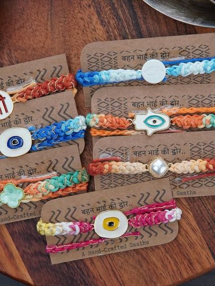 My full collection of charm rakhis, each with a unique centerpiece.