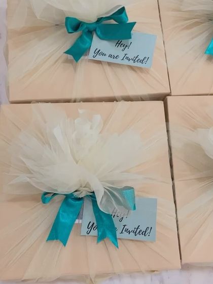 Another view of our beautifully wrapped invitation boxes, perfect for any formal or corporate event.