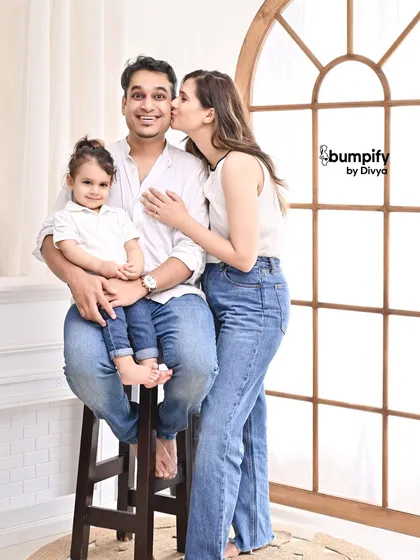 Sometimes, a simple, classic family portrait says it all. I love capturing the easy, happy connection between a family in a clean, bright studio setting, creating a timeless image you'll cherish forever.