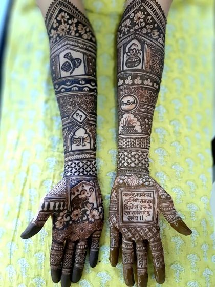 This intricate bridal mehendi includes a special verse written in Sanskrit, adding a deeply personal and spiritual touch for the bride.