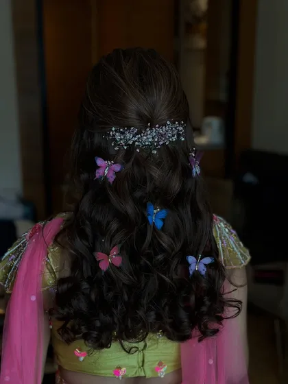 Another view of the playful and pretty butterfly hairstyle.
