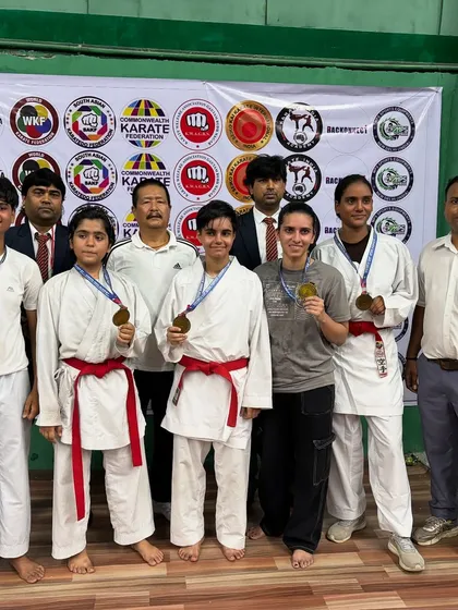 Our female athletes with their medals from the 2nd Victor Cup Open Karate Championship, alongside officials and coaches. We train champions regardless of gender.