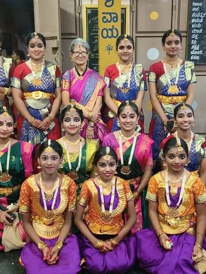 A full group photo with the organizers after the Navaratri performance.