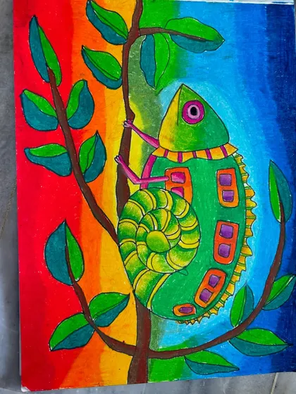 A close-up of a whimsical chameleon drawing, filled with vibrant colours and patterns. This piece is a great example of how we encourage imagination and detailed work.