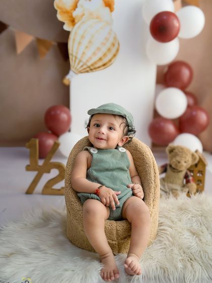 Six months of squish, sass, and sweetness. This half-birthday session is a wonderful way to celebrate the halfway point to their first birthday.