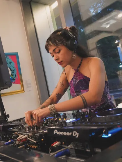Playing at an art gallery opening, showing my versatility in creating ambient, cool vibes for different settings.