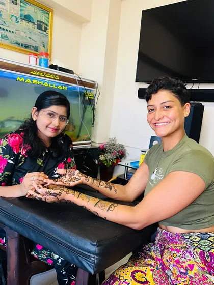 Here I am with my client from Switzerland. It's always an honor to introduce someone to the art of mehandi and share a piece of our culture with them.