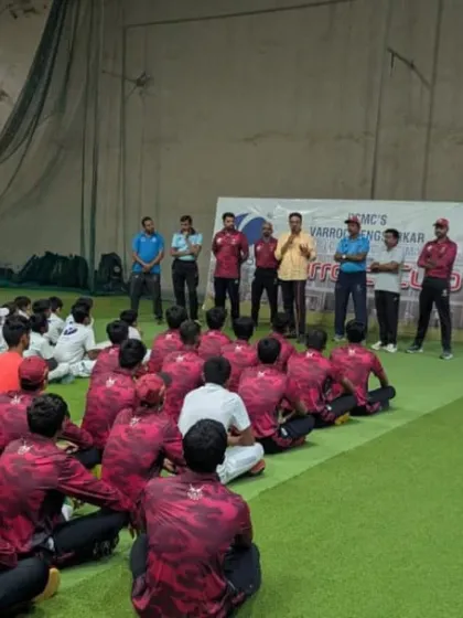 A wide shot of the address to the trainees, with both junior and senior batches listening intently.
