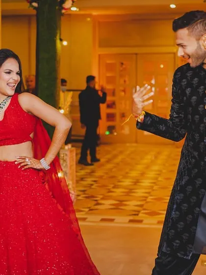 The perfect candid shot from a choreographed sangeet entry. We focus on moves that feel natural and let your personality shine.