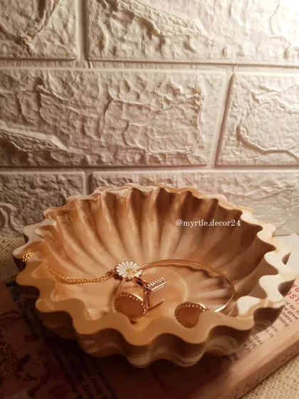 We created this beautiful floral bowl with a unique "Mocha Mousse" marbled effect. The wavy, petal-like edges make it a stunning centerpiece or a catch-all bowl for your entryway.