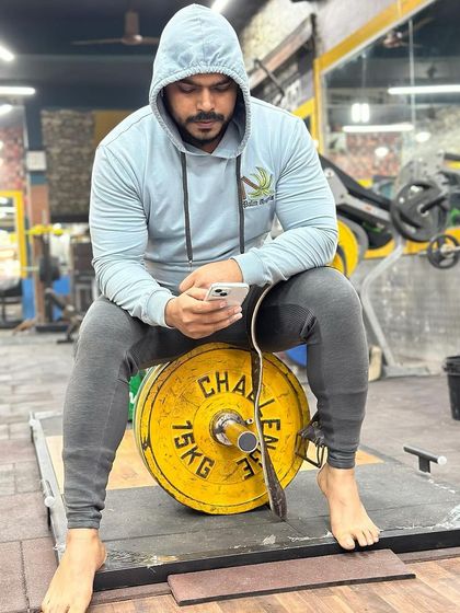 Resting on the weights. Sometimes the barbell is your best bench.