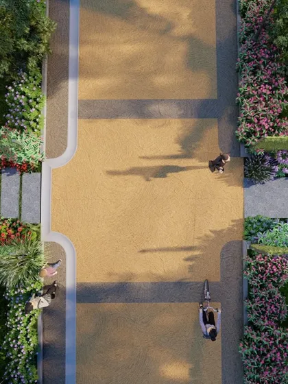 A daytime render of the main walkway at our Sakleshpur site, showcasing the planned arrangement of hedges, flowering beds, and pedestrian crossings.
