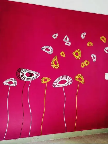 A playful abstract floral mural on a bright magenta wall. This design uses simple lines and shapes to create a modern and cheerful atmosphere.