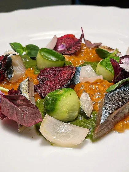 Torched Mackerel with an escabeche of vegetables and wasabi-watercress purée. A bold and flavorful seafood appetizer.