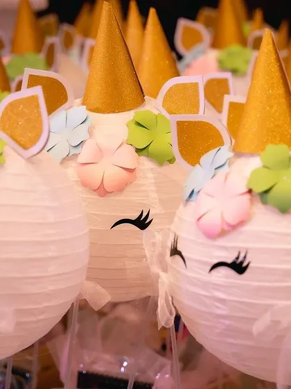 A whole army of our handmade unicorn paper lantern return gifts, ready to go to their new homes.