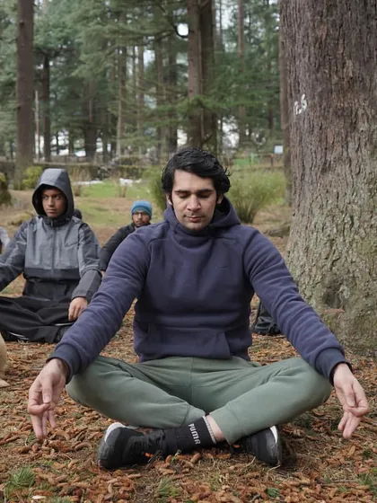 After the grind, we find our peace. Here I am leading a meditation session in the quiet of the Manali forest, with one of our local four-legged friends joining in. Training the mind is just as important as training the body.