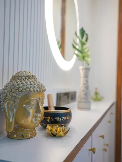 A close-up on the decor that sets a peaceful mood for this home's entrance.