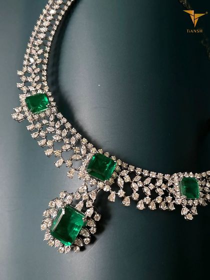 For the woman who appreciates refined elegance, this necklace is crafted to add a luxurious touch to your festive ensemble. The large emerald-cut stones are classic and captivating.