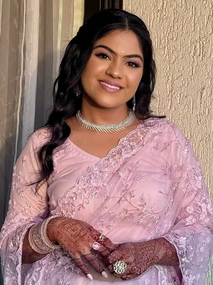 A soft blush palette and delicate details for this bride. The makeup enhances her natural beauty with a modern, charming twist.