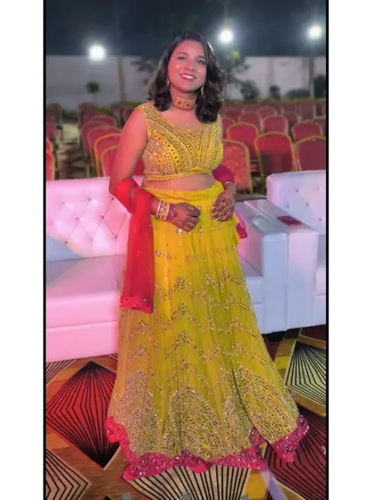 Another vibrant yellow lehenga option, this one with all-over mirror work that sparkles and shines.