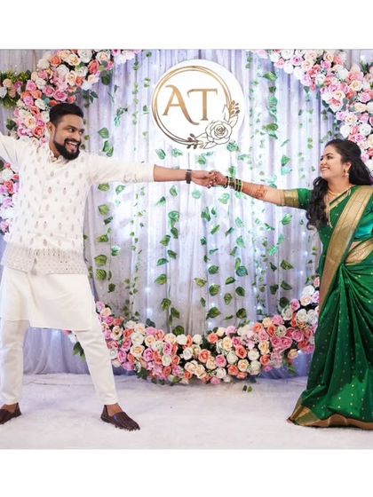 A fun and dynamic dance pose from a Sangeet night, full of energy and happiness.
