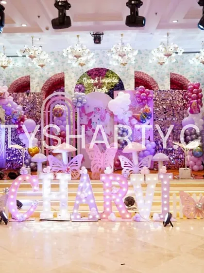 We design breathtaking main stages that become the centerpiece of your celebration. This butterfly princess theme combines intricate cutouts, soft balloon clouds, and marquee lighting to create a truly magical fairytale setting for the birthday girl.