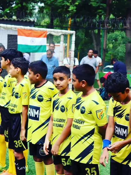 Our young players lined up for the national anthem during the Independence Cup. These events instill a sense of pride and respect alongside a love for football.