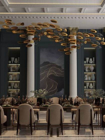 This dining room is designed as a jewel box for entertaining. A cascading gold chandelier illuminates the rich, dark walls and neoclassical columns, creating a dramatic and opulent setting for memorable meals.