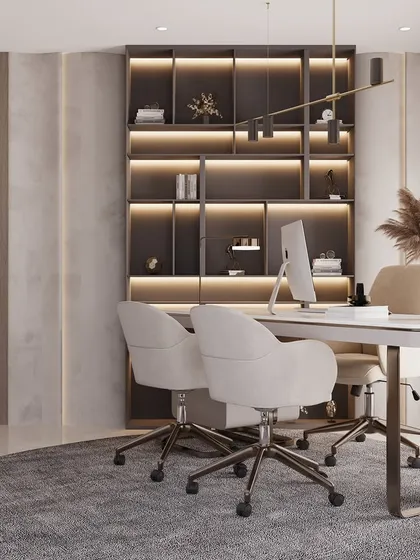 We designed this luxury home office to be both a productive and an inspiring environment. The space features a large desk for two, extensive backlit shelving for storage and display, and a sophisticated color palette, creating a perfect executive workspace at home.