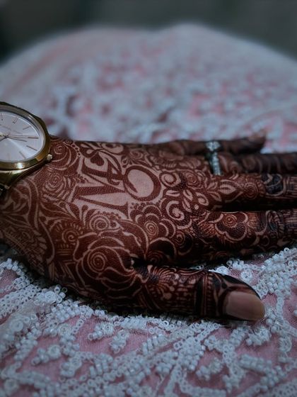 A stylish shot of the developed henna stain, with the initial 'N' clearly visible. My natural henna ensures the personalized elements are just as dark and rich as the rest of the design.