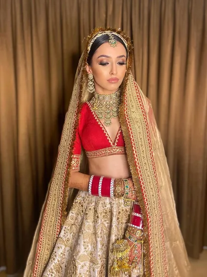 The full bridal ensemble for Pawlin. The makeup was designed to be bold and confident, matching the elegance of her Sabyasachi outfit.