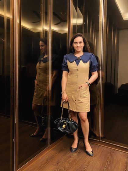 My outfit of the day, featuring this faux leather dress with a contrasting collar. It's a great example of a piece that has interesting details, making it easy to style for a chic look.