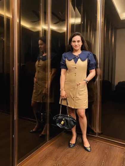 My outfit of the day, featuring this faux leather dress with a contrasting collar. It's a great example of a piece that has interesting details, making it easy to style for a chic look.
