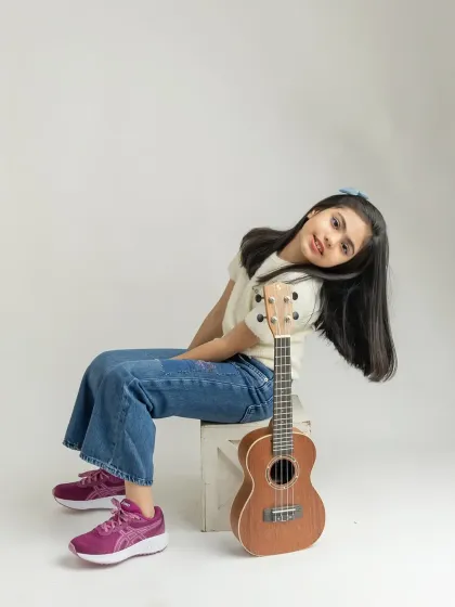 A relaxed and cool pose, showing a different side of her personality.