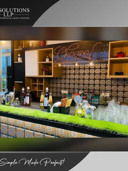 The "Cheers" neon sign says it all. We bring the full bar experience, including ambiance, to your home.