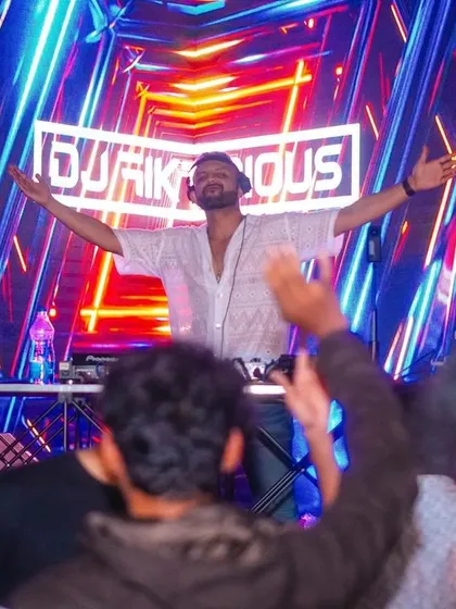Arms wide open, embracing the energy of the crowd. This is me in my happy place.