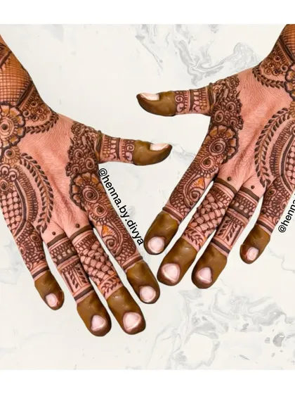 An intricate design for the back of the hands, blending different elements. I've used checks, paisleys, and florals to create a rich texture that is both modern and timeless.