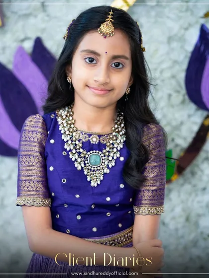 From our client diaries, a beautiful young client dressed in a custom-designed Sindhu Reddy creation. This royal blue ensemble features intricate Zari work and embellishments, perfect for grand occasions like weddings and sangeets.
