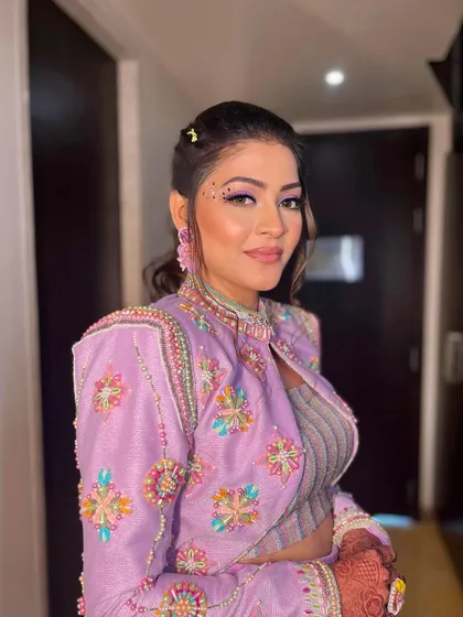 Krisha looking bold and beautiful with her unique carnival makeup.