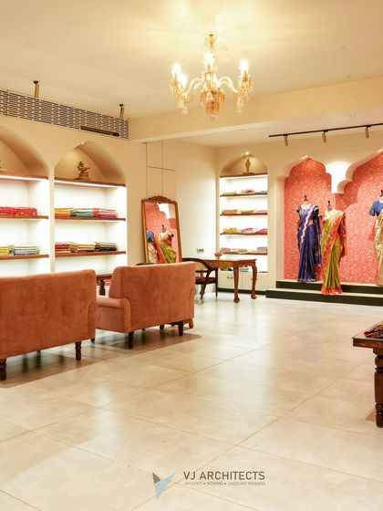 A slightly different angle of the showroom, emphasizing the depth of the space and the arched architectural details.