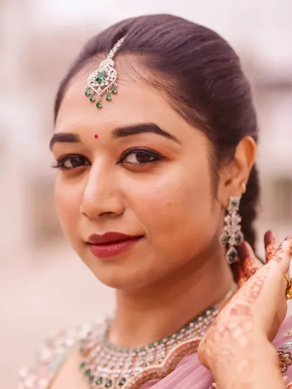 A closer look at this bride's soft glam makeup. I focused on enhancing her natural features with a flawless base, defined eyes, and a beautiful lip color that complements her entire look.
